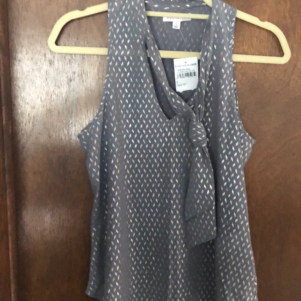 Grey with metallic shapes top